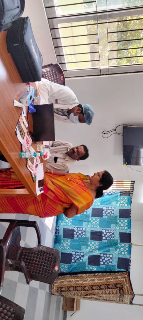 Seeking dental advise from the dentist in the Health Camp.jpeg